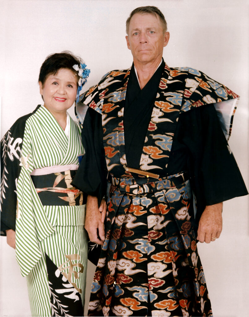 Photo of Yoshiko and Charles Cane, dressed in Kimono